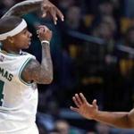 Boston, MA 1-3-17: Celtics guard Isaiah Thomas (4) as he was driving to the basket in the first half stopped and dished the ball off to a teammate instead. He recorded a career high 15 assists to go along with 29 points in leading Boston to a 115-104 victory over the JAzz. The Boston Celtics hosted the Utah Jazz in a regular season NBA basketball game at the TD Garden. (Globe Staff Photo/Jim Davis) reporter: himmelsbach topic: Celtics-Jazz 
