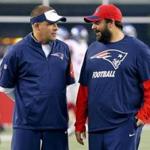 New England Patriots offensive coordinator Josh McDaniels, left, talk with defensive coordinator Matt Patricia before their NFL football game against the New York Giants Thursday, Sept. 3, 2015, in Foxborough, Mass. (AP Photo/Winslow Townson) 