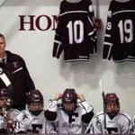 Falmouth, MA - 1/04/2017 - Falmouth head coach Paul Moore behind the bench. The Falmouth High boys' hockey team plays its first game since a car accident claimed the lives of players Owen Higgins and James Lavin. - (Barry Chin/Globe Staff), Section: Sports, Reporter: David Souza, Topic: 05falmouth, LOID: 8.3.1191073667.