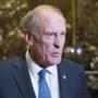 Former Indiana Senator Dan Coats spoke with the press following a meeting with Donald Trump in November. 