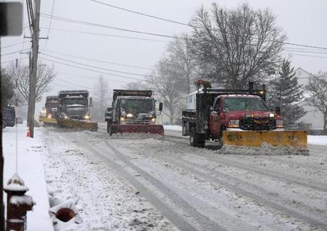 Snow plows were on Granite Street in Milton on Saturday.
