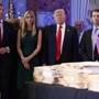 President-elect Donald Trump, accompanied by his family, arrived a news conference.