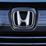 The logo of Honda Motor Co. is seen on a Honda vehicle at the Japanese automaker's headquarters in Tokyo, Wednesday, Jan. 11, 2016. Honda Motor Co. is recalling 772,000 additional Honda and Acura vehicles in the U.S. for defective front passenger seat air bag inflators made by Japanese supplier Takata Corp. The vehicles, announced in a recall late Tuesday, Jan. 10, 2017, by Honda in the U.S., are part of an expanded recall of 1.29 million vehicles, including those affected by earlier recalls. (AP Photo/Shuji Kajiyama)