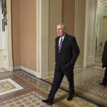 epa05711906 US Senate Majority Leader Mitch McConnell (L) walks to his office from the Senate floor during an after hours series of votes on amendments to the budget bill before the Senate in the US Capitol in Washington, DC, USA, 11 January 2017. EPA/SHAWN THEW