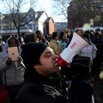 Brock Satter, a member of the Mass Action Against Police Brutality group, led a chant during the Martin Luther King Day March for Justice in Dorchester on Monday.