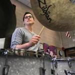 Nick Adair of the Foxborough High School Jazz Ensemble rehearsed in 2013.  A recent study from MIT found that people who are asked to repeat random series of beats tend to reorganize them according to familiar patterns. 