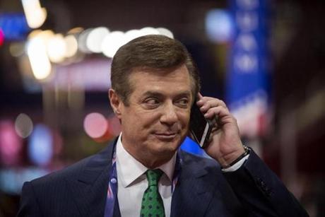 Former Trump campaign chairman Paul Manafort spoke on his phone in July.
