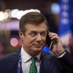 Former Trump campaign chairman Paul Manafort spoke on his phone in July.
