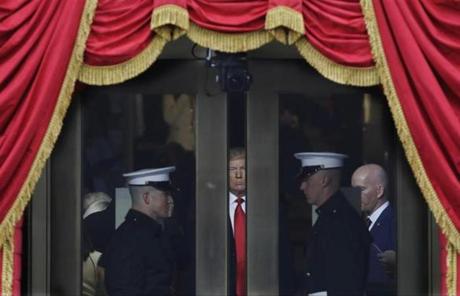President-elect Donald Trump waits to stop out onto the portico for his Presidential Inauguration at the U.S. Capitol in Washington, Friday, Jan. 20, 2017. (AP Photo/Patrick Semansky)
