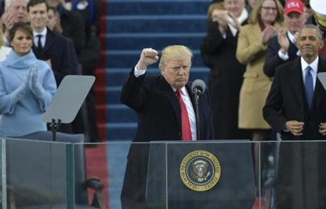 US President Donald Trump pumps his fist after addressing the crowd during his swearing-in ceremony on January 20, 2017 at the US Capitol in Washington, DC. / AFP PHOTO / Mandel NGANMANDEL NGAN/AFP/Getty Images
