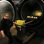 Brendan Geldart loaded a rack of circular blades into an oven that heat treats them at the Hyde Group?s factory in Southbridge.