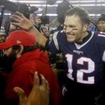 Foxborough, MA - 1/22/2017 - Tom Brady celebrates with teammates after the victory. The New England Patriots host the Pittsburgh Steelers in the AFC Championship game at Gillette Stadium in Foxborough, Mass., on Jan. 22, 2017. (Stan Grossfeld/Globe Staff)