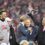 Foxborough MA 1/22/17 New England Patriots owner Robert Kraft holding up the AFC Championship Trophy after they defeated the Pittsburgh Steelers 36-17 during the AFC Championship game at Gillette Stadium. (Photo by Matthew J. Lee/Globe staff) topic: reporter: 