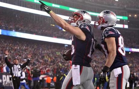 Chris Hogan (left) celebrated his touchdown with teammate Danny Amendola in the first quater. 
