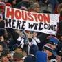 As the Patriots victory drew to a close Sunday night, a fan held up a sign for the upcoming trip to the Super Bowl in Houston. Jim Davis/Globe Staff