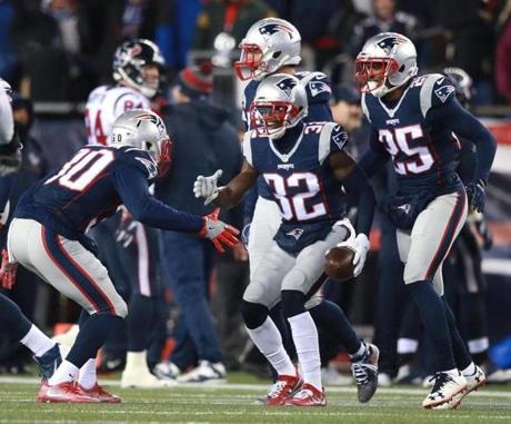 Foxborough, MA - 1-14-17 - Devin McCourty (32) celebrates with teammates after his interception during third quarter action during AFC Divisional Playoff game - Gillette Stadium. Houston Texans @ New England Patriots. (Jim Davis/Globe staff)
