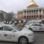 BOSTON, MA - 3/07/2016: Taxi drivers demonstrated with signs and cabs on Beacon and Park Street Boston asking for respect, stop discrimination and safety by the Massachusetts State House. Their protest to raise awareness about the UBER Legislation that is up for vote in the State House this Wednesday. (David L Ryan/Globe Staff Photo) SECTION: METRO TOPIC stand alone photo