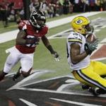 Green Bay Packers' Jared Cook catches a touchdown pass in front of Atlanta Falcons' Keanu Neal during the second half of the NFL football NFC championship game Sunday, Jan. 22, 2017, in Atlanta. (AP Photo/David J. Phillip)