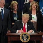 President Donald Trump signed an executive order to start the Mexico border wall project at the Department of Homeland Security Wednesday.