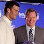 FILE - In this Feb. 2, 2015, file photo, New England Patriots quarterback Tom Brady, left, poses with NFL Commissioner Rodger Goodell during a news conference where Brady was presented the Super Bowl MVP in Phoenix, Ariz. Brady's four-game suspension for his role in using underinflated footballs during the AFC championship game last season has been upheld by Commissioner Goodell. The league announced the decision Tuesday, July 28, 2015. (John Samora/The Arizona Republic via AP, File) MARICOPA COUNTY OUT; MAGS OUT; NO SALES