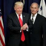 (CORRECTED VERSION) WASHINGTON, DC - JANUARY 25: (AFP-OUT) U.S. President Donald Trump is joined by Homeland Security Secretary John Kelly (R) during a visit to the Department of Homeland Security January 25, 2017 in Washington, DC. While at the department Trump signed two executive orders related to domestic security and to begin the process of building a wall along the U.S.-Mexico border. (Photo by Chip Somodevilla/Getty Images)