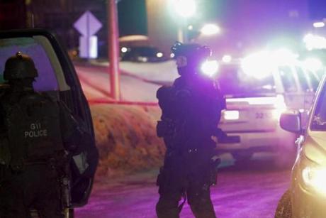 Police surveyed the scene after a deadly shooting at a mosque in Quebec City, Canada, on Sunday.
