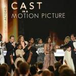 Actress Taraji P. Henson (C) and other cast members accept the award for Outstanding Performance by a Cast in a Motion Picture for 'Hidden Figures' during the 23rd Annual Screen Actors Guild Awards show at The Shrine Auditorium on January 29, 2017 in Los Angeles, California. / AFP PHOTO / Robyn BECKROBYN BECK/AFP/Getty Images