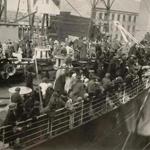 S.S. Carmania arriving with immigrants from Eastern Europe in 1923, docking at East Boston immigration station.