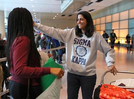 Boston-02/03/2017 . MIT student from Iran, Kiki Rahmati Rt) is greeted as she arrives at Logan Airport,. There was a welcoming for arriving refugees and immigrants at Logan Airport international terminal, who were previously not allowed to fly to Boston. John Tlumacki/The Boston Globe(metro)
