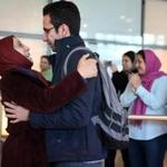 Moshen greeted his mother Kefayat as she arrived on a flight from Iran at Logan International Airport on Saturday.