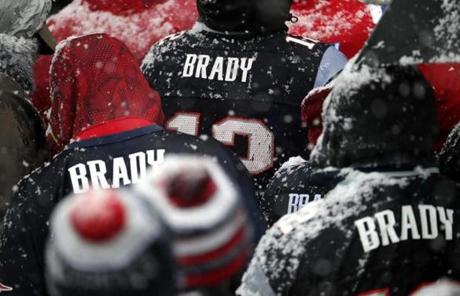 Boston, MA - 2/07/2017 - New England Patriots fans stood for hours in the snow, sleet, and freezing rain in anticipation of seeing their team at city hall plaza. New England Patriots Super Bowl Parade 2017. - (Barry Chin/Globe Staff), Section: Metro, Reporter: Globe Staff, Topic: 08parade, LOID: 8.3.1553838056.
