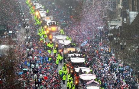 Boston-02/07/2017 . The New England Patriots celebrated their victory with a duck boat parade down Boylston Street, as thousands of fans lined the route. John Tlumacki/The Boston Globe(metro) New England Patriots Super Bowl Parade 2017
