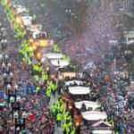 Patriots fans were exuberant hours before the start of the Super Bowl victory parade in Boston.