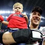 HOUSTON, TX - FEBRUARY 05: Nate Solder #77 of the New England Patriots celebrates with his son Hudson Solder after defeating the Atlanta Falcons during Super Bowl 51 at NRG Stadium on February 5, 2017 in Houston, Texas. The Patriots defeated the Falcons 34-28. (Photo by Al Bello/Getty Images)
