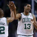 Boston, MA - 06/07/12 - (fourth quarter) Boston Celtics center Fab Melo (13) gets a hand from Boston Celtics shooting guard Leandro Barbosa (12) after scoring late in garbage time. Boston Celtics NBA basketball, action and reaction. The Celtics play the Los Angeles Lakers at TD Garden. - (Globe Staff Photo / Barry Chin), section: Sports, reporter: Baxter Holmes, slug: 08Lakers-Celtics, LOID: 5.1.553378088. 
