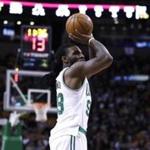 Boston Celtics forward Jae Crowder (99) shoots during the first quarter of an NBA basketball game in Boston, Wednesday, Feb. 1, 2017. (AP Photo/Charles Krupa)