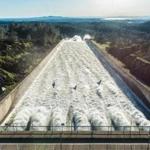 Water flowed down the Oroville Dam main spillway at 55,000 cubic feet per second Saturday. 