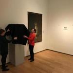The staff of the Davis Museum de-installs works as part of the ?Art-Less? project. 