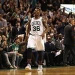 Boston, MA -- 2/15/2017 - Celtics Marcus Smart reacts after hitting a three pointer against the 76ers during the fourth quarter of action at TD Garden. (Jessica Rinaldi/Globe Staff) Topic: Reporter: 