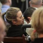 (POOL PHOTO)Brighton, MA., 02/03/16, Tina Cellucci, wife of the severely injured Kevin Cellucci of Dorchester, speaks to her disabled husband in the courtroon. NIKOLAS PAPADOPOULOS (D.O.B. 4/8/95) was sentenced following his conviction for negligent operation of a motor vehicle in a Sept. 6, 2013, collision on the Arborway that left one victim unable to speak or move on his own, another victim paralyzed from the waist down, and several others with less serious injuries. Suzanne Kreiter/Globe staff