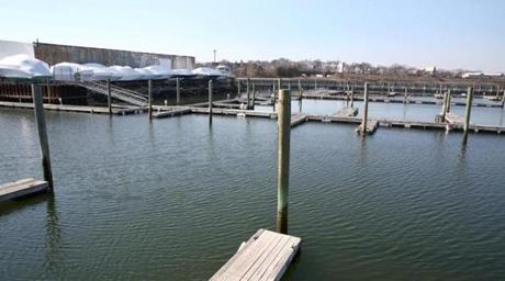 Boston, MA--2/23/2017 - The boat slips will be replanned. Developer Ryan Sillery (cq) has bought property at Russo/MarineMax (cq) in Dorchester. RODE Architects Inc partners Kevin Dealer (cq) and Eric Robinson (cq) are designing a redevelopment, that will include waterfront condos, a hotel, restaurant, park, retail space, and a refurbished marina. Photo by Pat Greenhouse/Globe Staff Topic: 24marine Reporter: Jon Chesto
