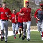 Fort Myers, FL - 2/14/2017 - Boston Red Sox pitchers Chris Sale, Rick Porcello, and David Price end their workout with a run. Red Sox Spring Training. Day Two. Pitchers and catchers first workout at Jet Blue Park in Fort Myers, FL. - (Barry Chin/Globe Staff), Section: Sports, Reporter: Peter Abraham, Topic: 14Res Sox, LOID: 8.3.1634172896.
