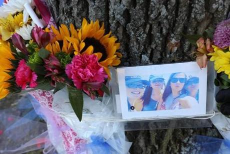A memorial took shape on Pond Street in Stoneham at the site of the fatal crash, with balloons, flowers, with a photograph of Sydney Coiro and her friends among the items. 
