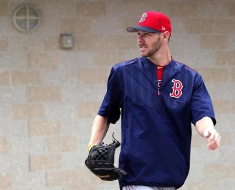 Fort Myers, FL - 2/13/2017 - Red Sox Spring Training. Day One. Boston Red Sox pitcher Chris Sale exits the Sox clubhouse as he heads out for a long toss session. Pitchers and catchers report for spring training at Jet Blue Park in Fort Myers, FL. - (Barry Chin/Globe Staff), Section: Sports, Reporter: Peter Abraham, Topic: 14Res Sox, LOID: 8.3.1623409229.
