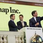 NEW YORK, NY - MARCH 2: (L to ) Snapchat co-founders Bobby Murphy, chief technology officer of Snap Inc., and Evan Spiegel, chief executive officer of Snap Inc., ring the opening bell as Thomas Farley, president of the NYSE, looks on, March 2, 2017 in New York City. Snap Inc. priced its initial public offering at $17 a share on Wednesday and Snap shares will start trading on the New York Stock Exchange (NYSE) on Thursday. (Photo by Drew Angerer/Getty Images)