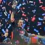 Houston, TX Feb. 5 2017: As confetti falls around him, Patriots quartetrback Tom Brady howls as he hoists the Vince Lombardi Trophy following New England's come from behind victory. The Atlanta Falcons play the New England Patriots in Super Bowl LI at NRG Stadium in Houston on Feb 5. (Globe Staff Photo/Jim Davis) reporter: various topic: Super Bowl