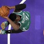 Boston Celtics forward Jaylen Brown goes in for a dunk during the first half of the team's NBA basketball game against the Los Angeles Lakers, Friday, March 3, 2017, in Los Angeles. (AP Photo/Mark J. Terrill)