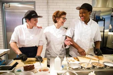 From left to right: line cook Vidalba Garcia, chef Jody Adams, and line cook Candace Blackwell prepared for dinner service at Porto in Boston. 
