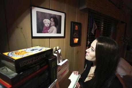 Casey Anthony looked at a portrait of her with her late daughter, Caylee, in her Florida home.
