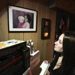 Casey Anthony looked at a portrait of her with her late daughter, Caylee, in her Florida home.